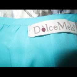 Качество одежды Dolce Mela